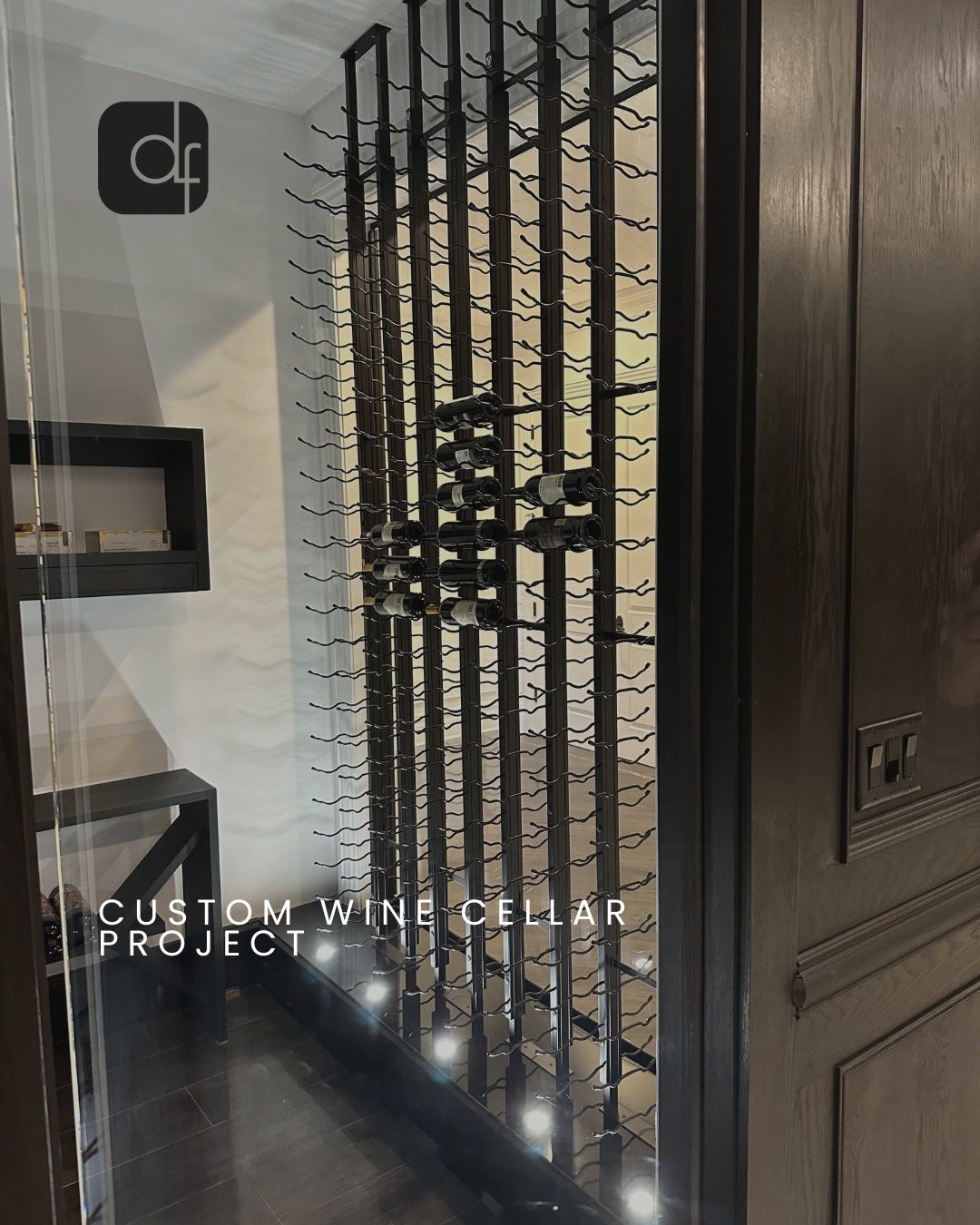 Glass wine cellar with LED floor lighting